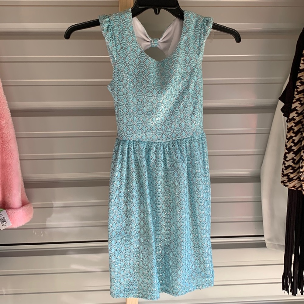 Size 12 dress, 100% . She will wow every one in this dress!